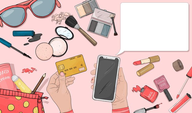 Kobiece dłonie płacą za zakupione kosmetyki online kartą kredytową i smartfonem