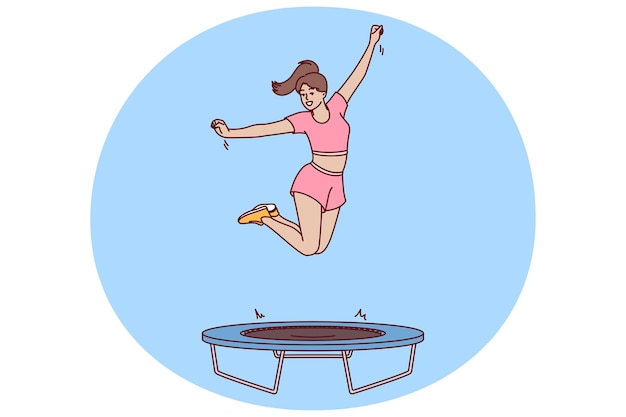 Kobieta trenerka fitness skacze na trampolinie ucząc klientów klubu sportowego prawidłowego wykonywania ćwiczeń