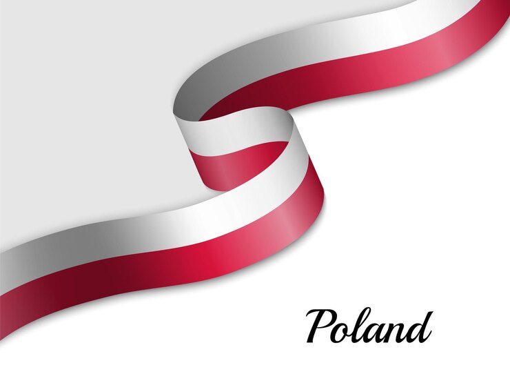 Macha wstążką flagi Polski
