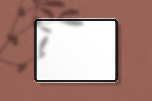 Makieta cyfrowego tabletu na brązowym tle wektora