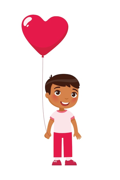 Mały chłopiec trzymając balon w kształcie serca. Obchody Walentynki. 14 lutego wakacje