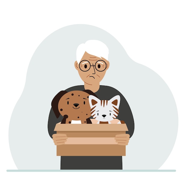 Mężczyzna trzyma karton z kotem i psem Koncepcja pomocy ratowniczej i opieki nad zwierzętami