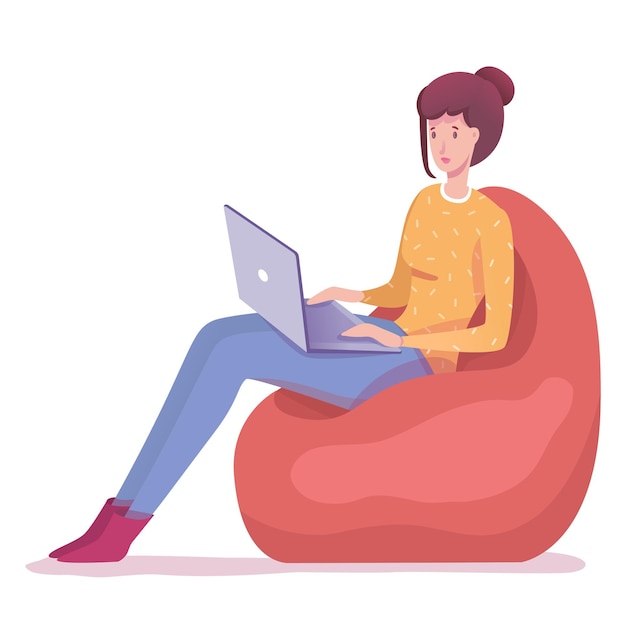 Młoda kobieta pracuje na laptopie siedzi w miękkim fotelu worek freelancer zaangażowany w zdalną pracę za pośrednictwem Internetu