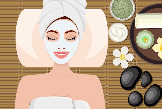 Młoda piękna kobieta w spa. Kobieta poddawana zabiegowi spa