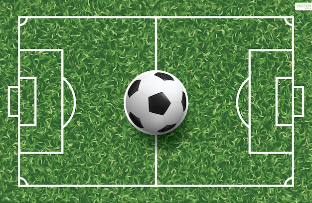 Plik wektorowy piłka nożna piłka na zielonej trawie boisko do piłki nożnej wzór i tekstura tło. ilustracja wektorowa.
