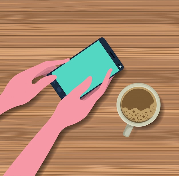 Plik wektorowy ręce za pomocą smartfona z filiżanką kawy w tabeli