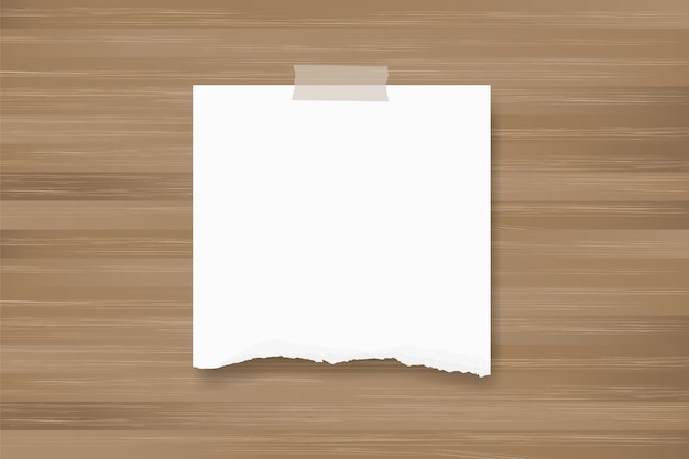 Rozdzierający papierowy tło kij na drewnianej teksturze.