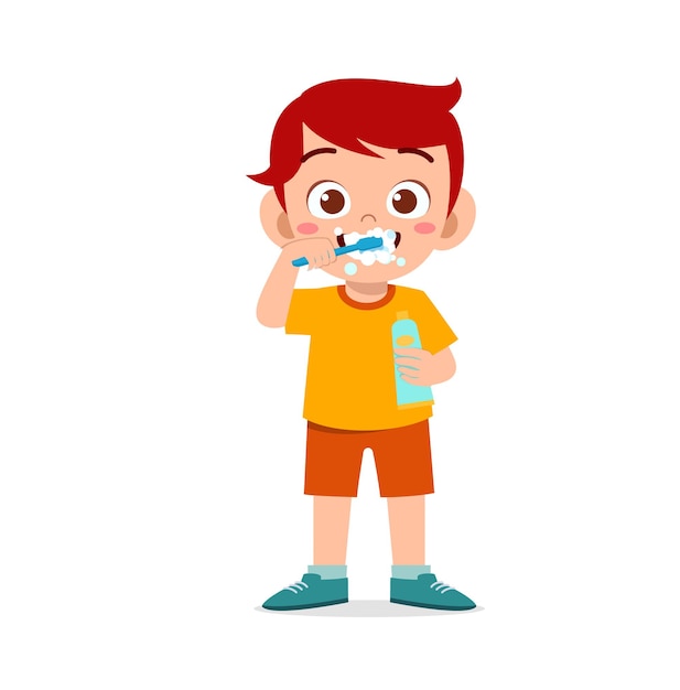 Śliczny Mały Chłopiec Myje Zęby I Trzyma Pastę Do Zębów