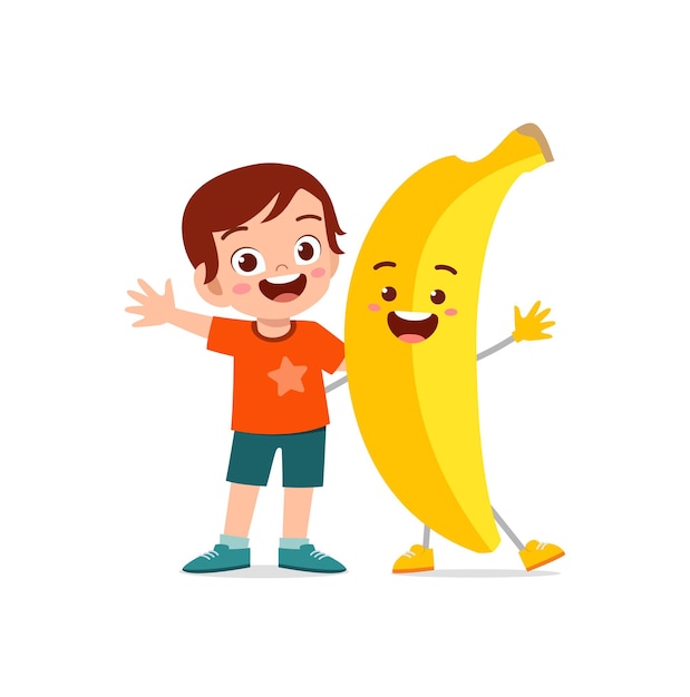 Śliczny Mały Chłopiec Stoi Z Postacią Banana