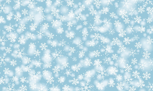 Śnieg tło. Zimowe opady śniegu. Białe płatki śniegu na niebieskim niebie. Boże Narodzenie tło. Spadający śnieg.
