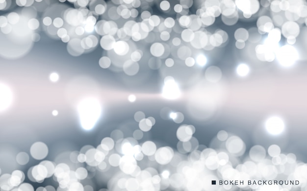 Srebny lekki abstrakcjonistyczny bokeh tło