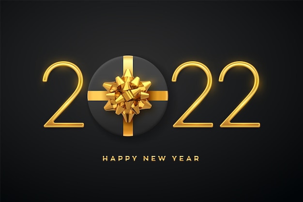 Szczęśliwego Nowego 2022 roku. Złote metaliczne luksusowe numery 2022 z pudełkiem prezentowym ze złotą kokardą na czarnym tle. Realistyczny znak dla karty z pozdrowieniami. Świąteczny plakat lub transparent wakacje. Ilustracja wektorowa.