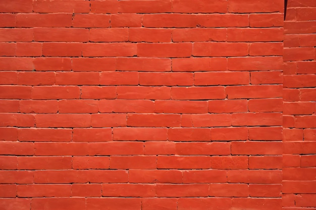 Tło ściany z czerwonej cegły