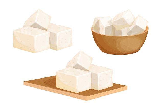 Plik wektorowy ustaw kawałki tofu w drewnianej misce na biurku do krojenia w stylu kreskówkowym