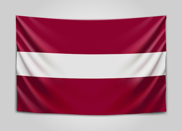 Plik wektorowy wisząca flaga łotwy. republika łotewska. łotewska flaga narodowa.