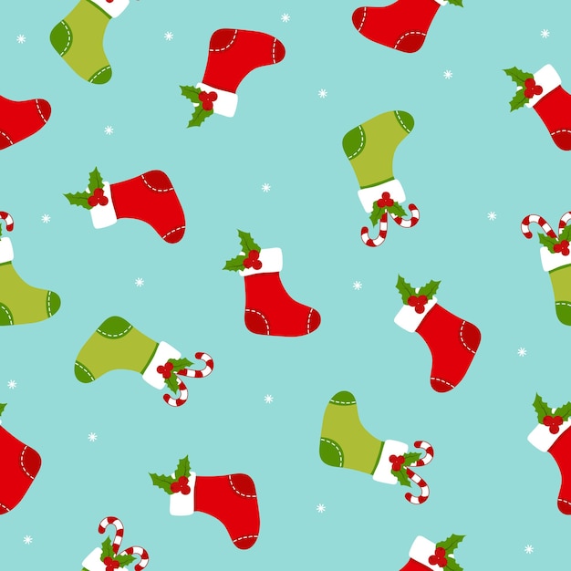 Wzorzec świąteczny z jagodami, trzcinami cukierkowymi, skarpetkami xmas i płatkami śniegu na niebieskim tle.