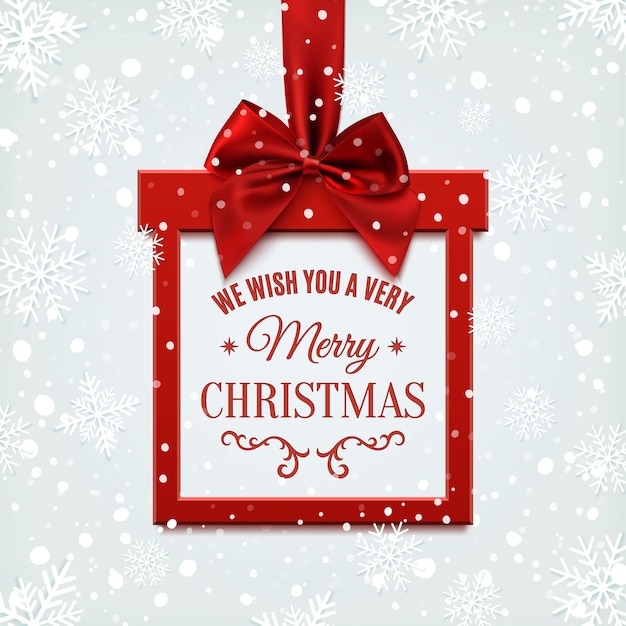 Życzymy Wesołych świąt Bożego Narodzenia, Kwadratowy Baner W Formie Prezentu Z Czerwoną Wstążką I Kokardką, Na Tle Zimowego śniegu I Płatków śniegu. Kartkę Z życzeniami Lub Szablon Transparent.