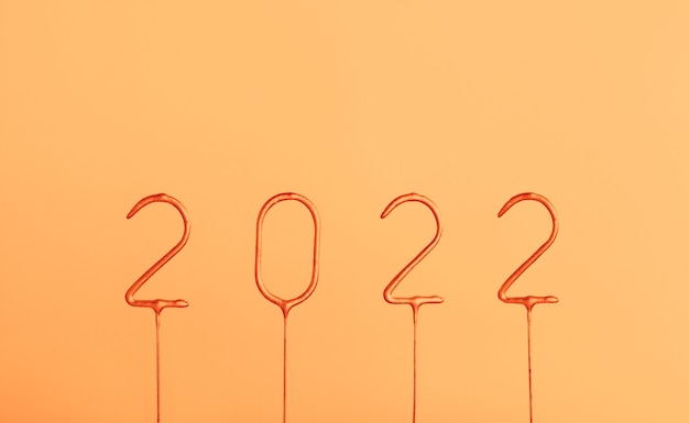 Zdjęcie 2022 numery szczęśliwego nowego roku i wesołych świąt banner szablon wakacje backgroun