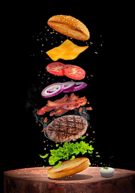 3d ilustracja pysznego burgera latających składników kreatywny projekt na białym tle na czarnym tle