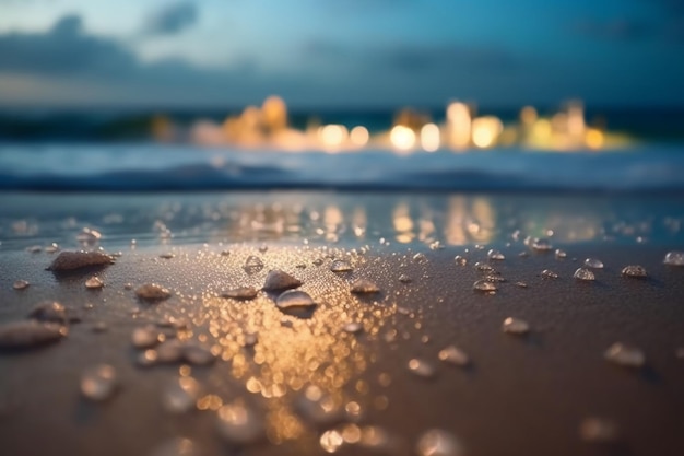 A zamknąć wody na plaży ze światłami w tle