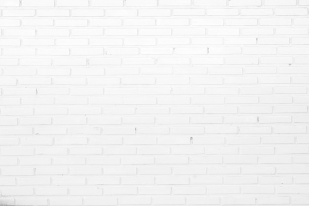 Abstrakcjonistyczny biały ściana z cegieł textured tło.