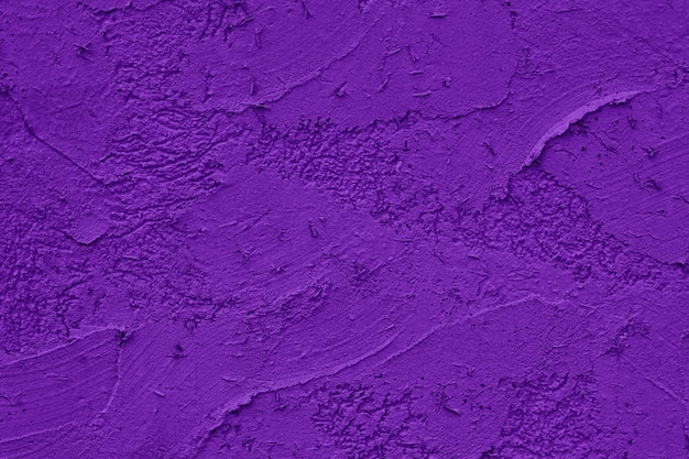 Abstrakcjonistyczny purpurowy teksturowanej kamiennej ściany tło