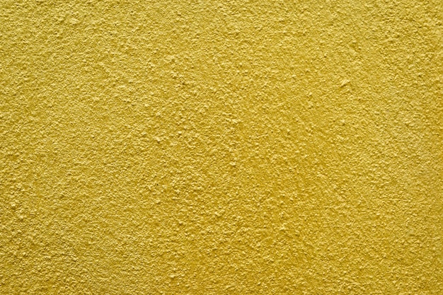 Abstrakcjonistyczny złocisty tło, Złocisty betonowej ściany tło, złota tekstura.