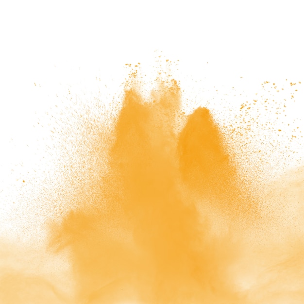 Abstrakcjonistyczny żółty pyłu wybuch na białym tle. Zatrzymaj ruch żółtego proszku w proszku.