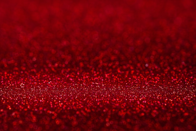 Zdjęcie abstrakcjonistyczny żywy czerwony lśnienie błyskotliwości ściany i podłoga tła perspektywiczny studio z plamy bokeh