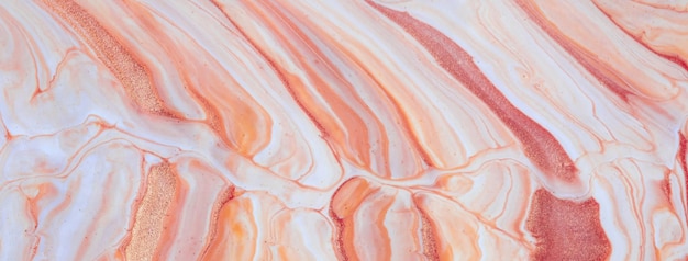 Zdjęcie abstrakcyjne płynne tło artystyczne jasnoczerwone i koralowe kolory brokatu płynny marmur malarstwo akrylowe na płótnie z różanym gradientem i pluskiem akwarela tło z wzorem białych fal