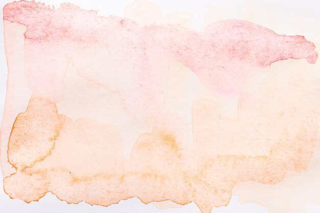 Zdjęcie abstrakcyjne tło akwarelowe plamy farby na białym papierze brązowym atramentem