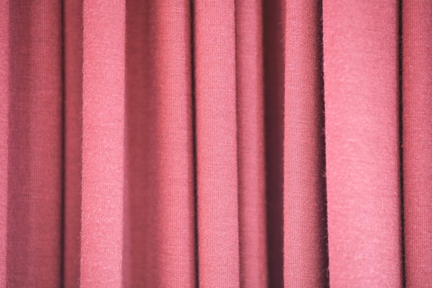 Abstrakcyjne tło koloru czerwonego Abstrakcyjna tekstura tkaniny lub materiału tekstylnego w kolorze czerwonym