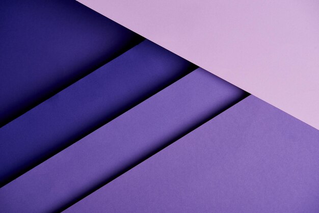 Zdjęcie abstrakcyjne tło z fioletowymi nakładającymi się arkuszami papieru