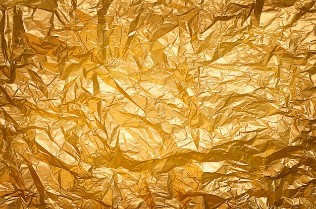 abstrakcyjne tło złotego zmiętego papieru