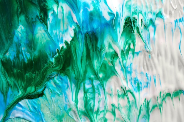 Abstrakcyjny płynny niebieski zielony wzór tła Kosmiczne fale morskie plamy farby kreatywna płynna sztuka Kolory planety Ziemia