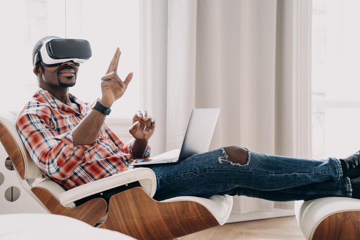 Zdjęcie afrykański freelancer w zestawie słuchawkowym vr cieszący się wizją w domu biznesmen ma wirtualne spotkanie