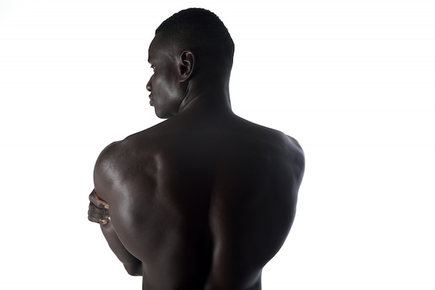 Zdjęcie afrykański mężczyzna z powrotem na bielu