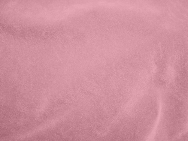 Aksamitna tekstura tkaniny w kolorze różowego złota używana jako tło Puste tło tkaniny w kolorze różowego złota z miękkiego i gładkiego materiału tekstylnego Jest miejsce na tekstx9