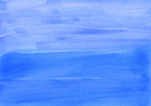 Akwarela ciemnoniebieskie tło tekstury ręcznie malowane. Aquarelle błękitne niebo streszczenie tło. Pociągnięcia pędzlem na papierze.