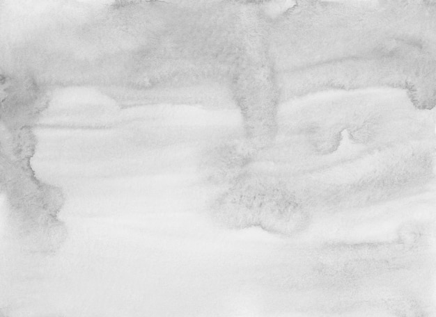 Akwarela jasnoszare i białe tło malowanie tekstury. Monochromatyczne plamy na papierowej nakładce. Nowoczesna sztuka abstrakcyjna aquarelle.