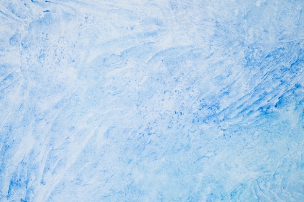 Zdjęcie akwarela niebieski streszczenie sztuka ręcznie obraz diy na teksturowanej tle papieru. tło akwarela. pomalowana mroźna lodowato zimna powierzchnia z przerywanymi liniami i plamami