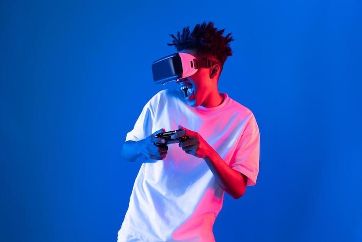 Zdjęcie amerykański afrykański gracz noszący vr joystick neon oświetlenie ściana sztuczka