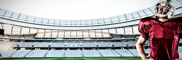 Zdjęcie amerykański piłkarz przeciwko stadionowi rugby o świcie