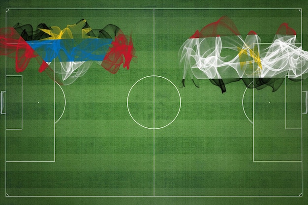 Zdjęcie antigua i barbuda vs egipt mecz piłki nożnej kolory narodowe flagi narodowe boisko do piłki nożnej gra w piłkę nożną koncepcja konkurencji skopiuj miejsce