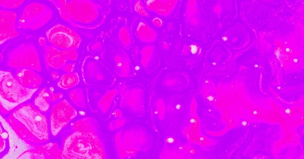 Zdjęcie artystyczne pociągnięcia pędzlem w kolorze melanżu i jasnego atramentu na tapecie dekoracyjnej w stylu grunge