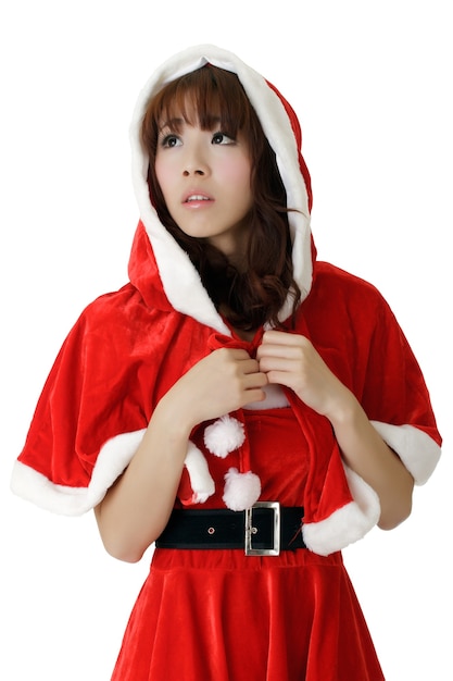 Asian Christmas dziewczyna, portret przeznaczone do walki radioelektronicznej z wyrazem smutku na twarzy na białej ścianie.