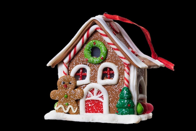 Bajkowy dom na Boże Narodzenie izoluje Piernikowy domek z piernikowym ludzikiem