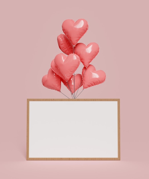 balony w kształcie serca trzymające pustą ramkę