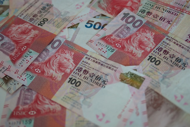 Banknot waluty Hongkong dolara (HKD) dla międzynarodowego biznesu finansowego i koncepcji giełdy