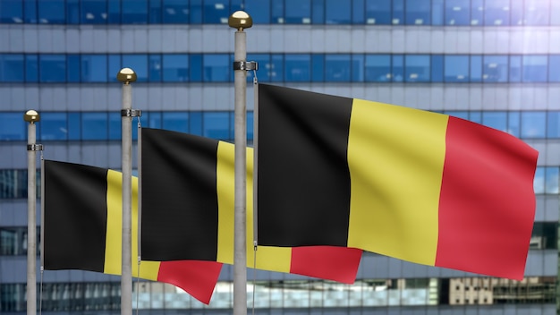 Belgijska flaga powiewa nowoczesnym miastem drapaczy chmur